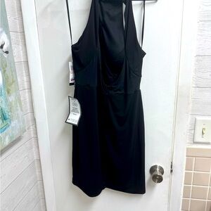 Brand new Sleeveless black cockta dress with gold stitching